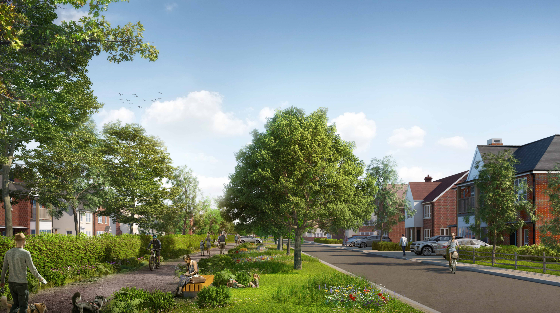 Tree-lined residential street with green central median, mixed housing styles, parked cars, and pedestrians under blue sky with white clouds.